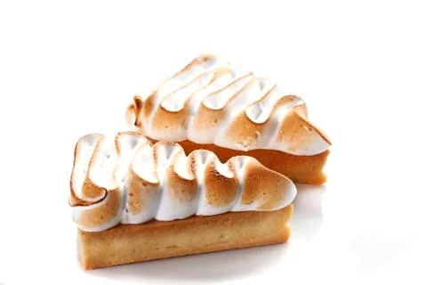 Triangular cake with custard on the top. Stock Photos