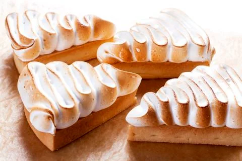 Triangular cake with custard on the top. 스톡 사진