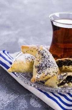 Triangular cookies with poppy seeds Stockfoto's