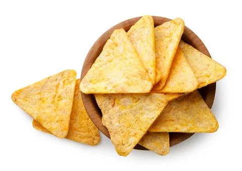 Triangular corn chips in a wooden plate on a white. Top view Stock Photos
