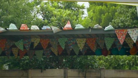 Triangular garland pattern pennant party flags. Triangle party flags in Stock Footage 235298645