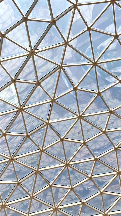 Triangular grid pattern glass ceiling reflecting urban architectural trends Stock Footage 286419132