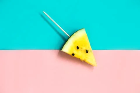 Triangular ice cream slices on a stick of ripe yellow watermelon 写真素材