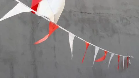 Triangular Indonesian flag decoration Stock Photos