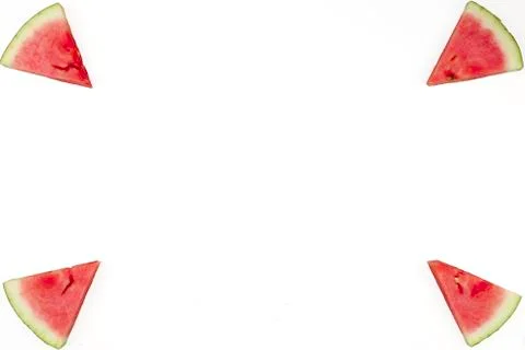 Triangular isolated slices of watermelon forming geometric games for copy spa Stock Photos