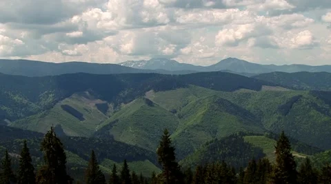 Triangular mountains and clouds Stock Footage 69009115