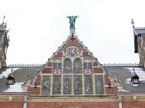 Triangular north facade with a tile tableau with the urban laundry of Amst... Stock Photos