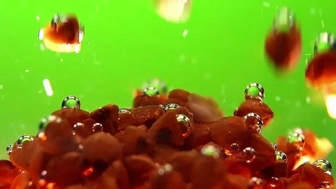 Triangular nuts of buckwheat are slowly falling in the water. Stock Footage 146968552