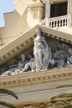 Triangular pediment with sculptures Malaga City Hall architectural detail Fotos de archivo
