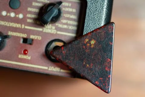 Triangular pick on top of speaker Stock Photos