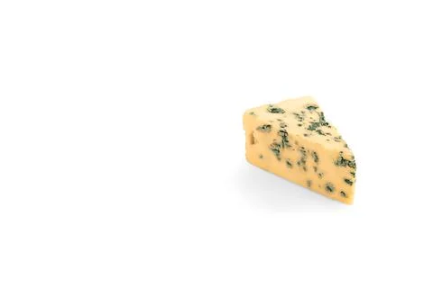 Triangular piece of cheese with mold. blue cheese. Wedge of soft blue cheese  Stockfoto's