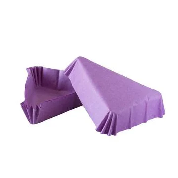 Triangular purple paper baking form for cakes Stockfoto's