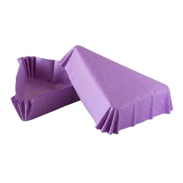 Triangular purple paper baking form for cakes Fotos Stock