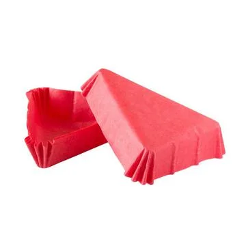 Triangular red paper baking form for cakes Fotos Stock