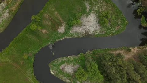 Triangular River Meander – Wide Diagonal Topdown Aerial Flight Along Long Edge Stock Footage 335243264