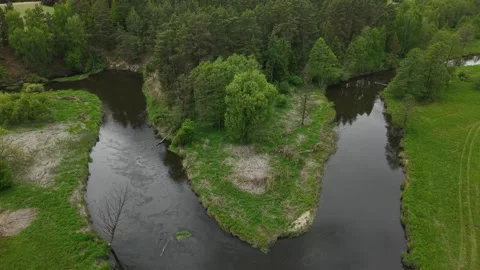 Triangular River Meander – Wide Forward Aerial Flight Toward the River Peninsula Stock Footage 335241869
