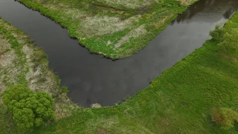 Triangular River Meander – Wide Orbit Left Aerial Flight Around River Bend Stock Footage 335281662