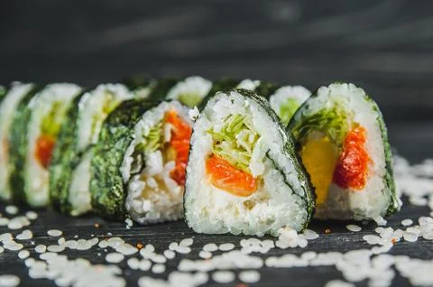 Triangular roll with salmon Stock Photos