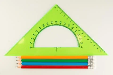 Triangular ruler for studying at school isolated Stock Photos