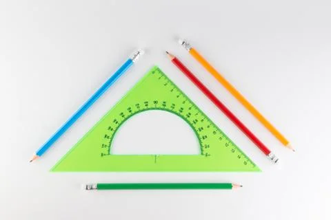 Triangular ruler for studying at school isolated Stock Photos