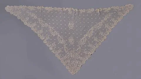Triangular scarf of application office with rosary and tulip. Natural appl... 库存照片