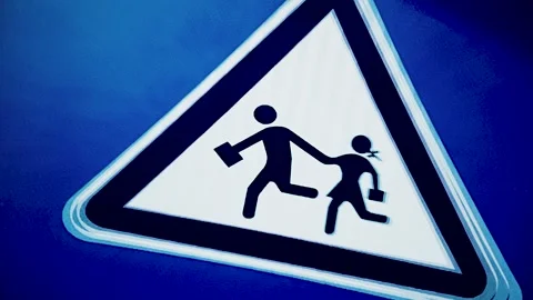 Triangular School Zone Warning Sign on Blue Background, Glitch Color Stock Footage 307209325