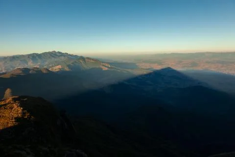 Triangular shadows of a mountain seen from the summit in mantiqueira range -  Stock Photos