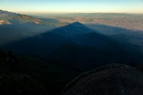 Triangular shadows of a mountain seen from the summit in mantiqueira range -  Stock Photos