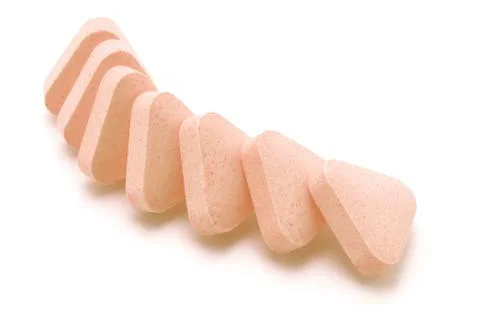Triangular shape vitamin tablets 스톡 사진