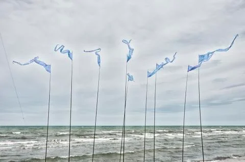 Triangular shape waving flags Stock Photos