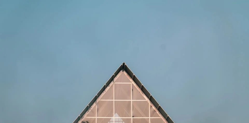 A triangular-shaped building Stock Photos
