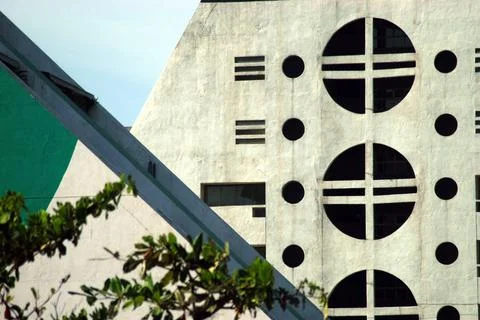 Triangular shaped commercial buildings with circular windows at CBD ( Cent... Stock Photos