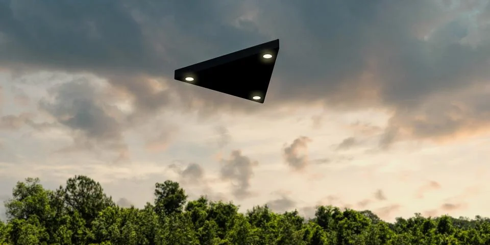 Triangular shaped ufo flying in the sky Illustrazione stock