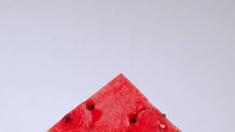 Triangular slice of watermelon. Organic juicy red watermelon healthy food 스톡 동영상 161777924
