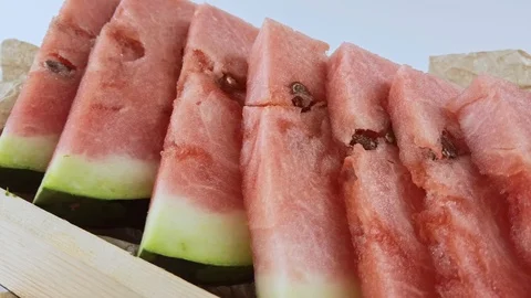 Triangular sliced watermelon slices on a table 스톡 동영상 126726816