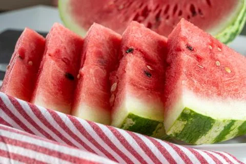 Triangular slices of ripe watermelon Stock Photos