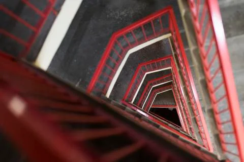 Triangular Stairs with red railings 스톡 사진