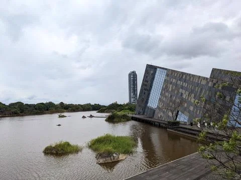 Triangular structure of Lanyang Museum next to a pond Stock Photos