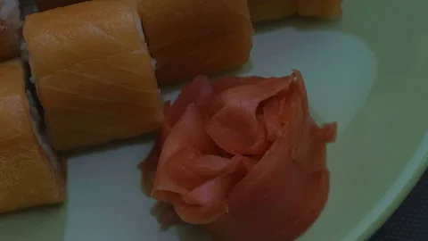 Triangular sushi rolls Philadelphia on a plate. Close-up Stock-Footage 75036778