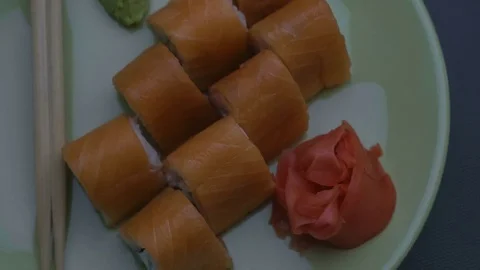 Triangular sushi rolls Philadelphia on a plate. Close-up. View from above Stock Footage 75037244