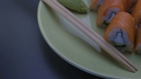 Triangular sushi rolls Philadelphia on a plate. Close-up Video stock 75046821