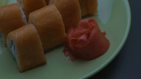 Triangular sushi rolls Philadelphia on a plate. Close-up Video stock 75185532
