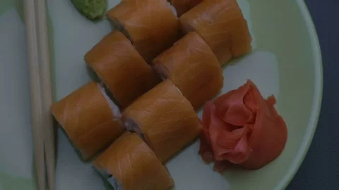 Triangular sushi rolls Philadelphia on a plate. Close-up Stock Footage 75186149