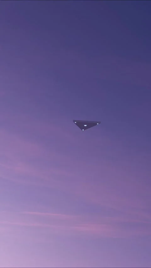 A triangular UFO flies over the ocean on a starry night. 3d render Stock Footage 296007549