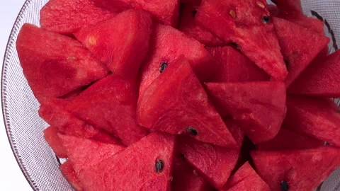 Triangular watermelon slices slowly rotate. Video stock 152472531