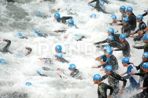 Triathletes on Start of the Barcelona Stock Photos