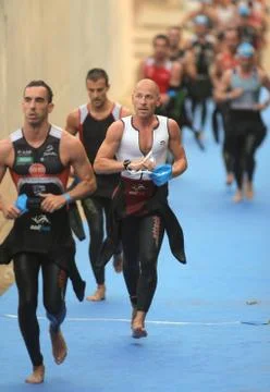Triathletes on transition zone Stock Photos
