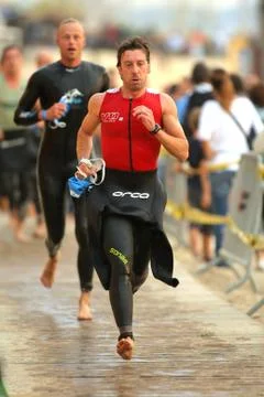 Triathletes on transition zone Stock Photos