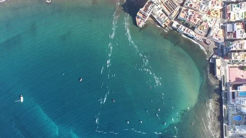 Triathlon swimmers doing the triangular race from top, high view. Swimming comp Stock-Footage 90456277