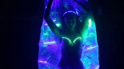 Tribal belly dance light show. Girl dancing in a nightclub Stock Footage